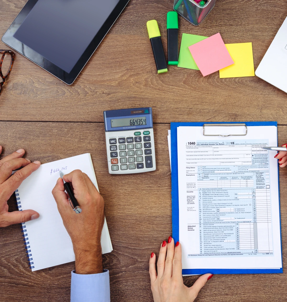 People working on tax forms together