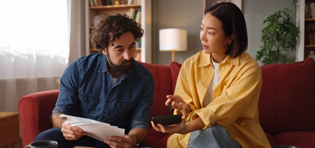 Man and woman reviewing documents together